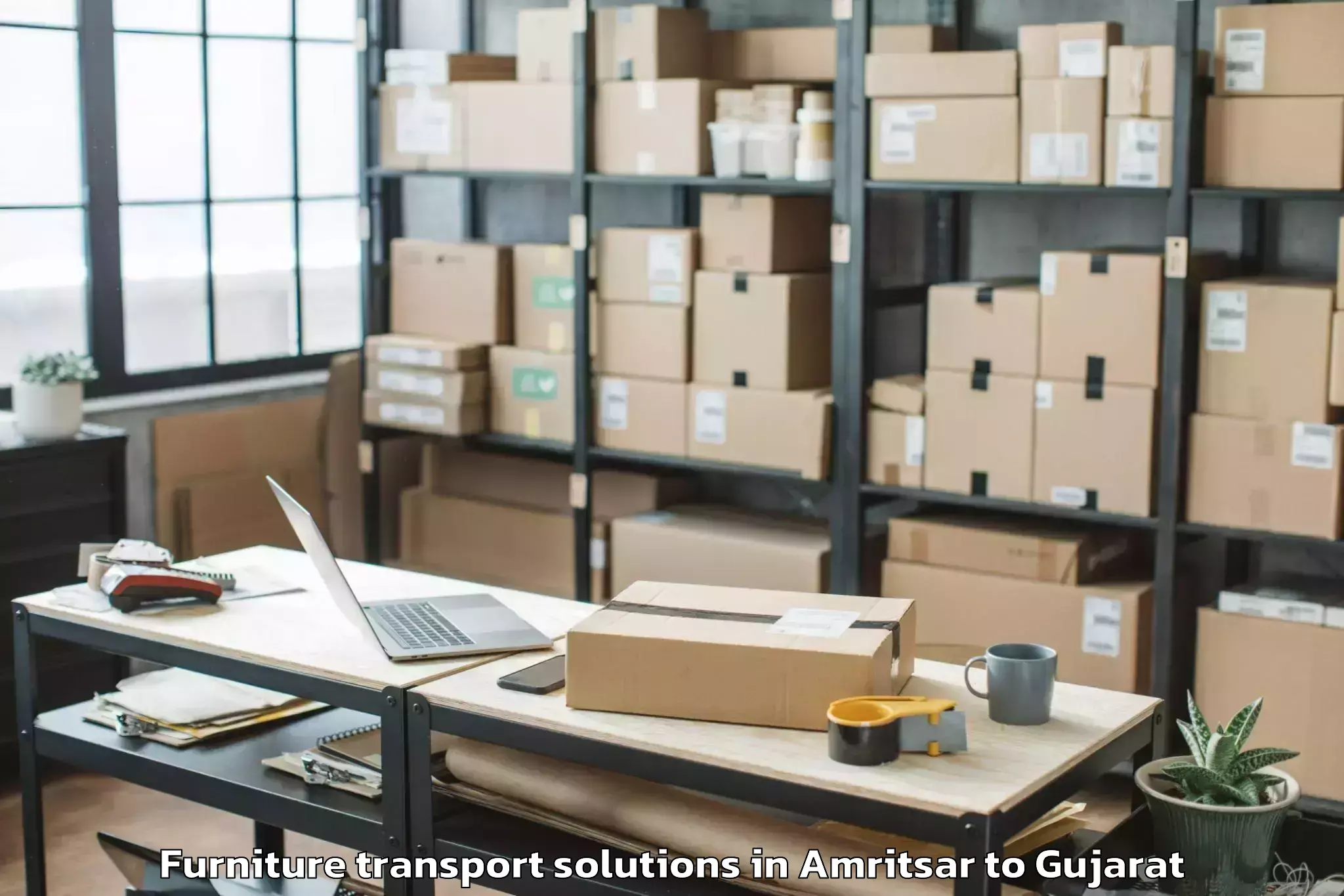 Book Amritsar to Mendarda Furniture Transport Solutions Online